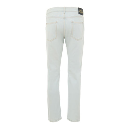 Jeans by Gucci for men in cotton denim & leather gold & light-blue features a polished silhouette with a polished relaxed-fit, reaching a polished long and finished with a polished .