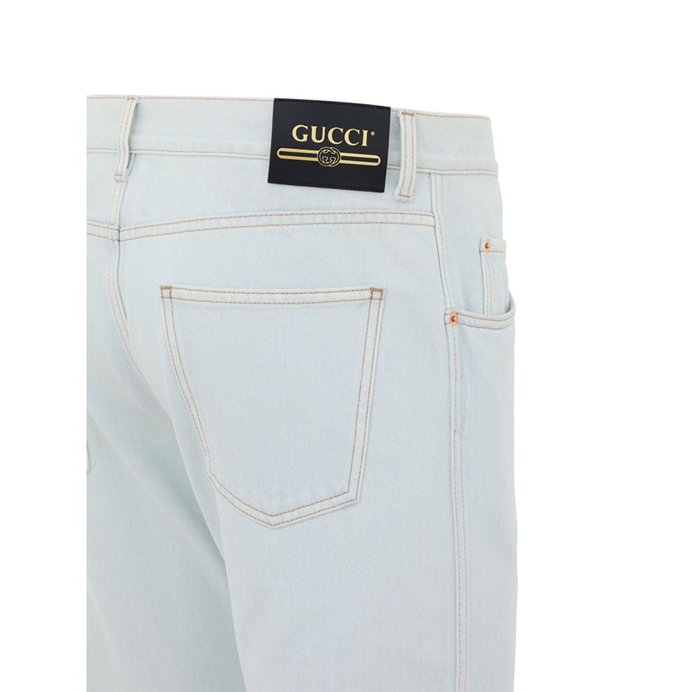 Jeans by Gucci for men in cotton denim & leather gold & light-blue features a refined silhouette with a refined relaxed-fit, defined by a and a refined long for a refined finish.