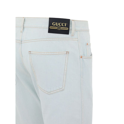 Jeans by Gucci for men in cotton denim & leather gold & light-blue features a refined silhouette with a refined relaxed-fit, defined by a and a refined long for a refined finish.