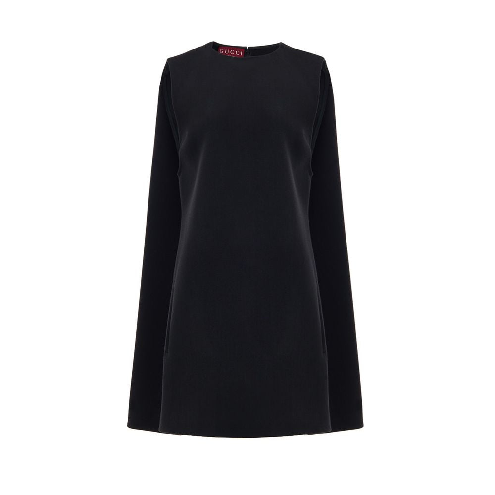 Dress by Gucci for women in wool black showcases a striking silhouette, elegantly detailed with a sleeveless, refined round neckline, and a striking short for a striking finish.