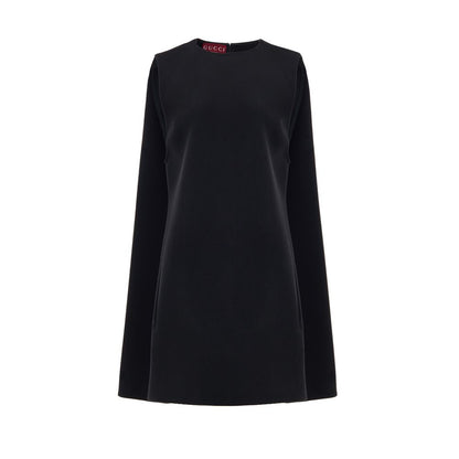 Dress by Gucci for women in wool black showcases a striking silhouette, elegantly detailed with a sleeveless, refined round neckline, and a striking short for a striking finish.