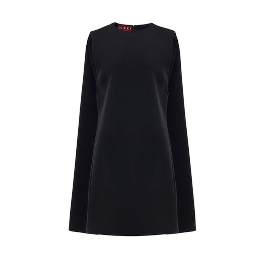 Dress by Gucci for women in wool black showcases a striking silhouette, elegantly detailed with a sleeveless, refined round neckline, and a striking short for a striking finish.
