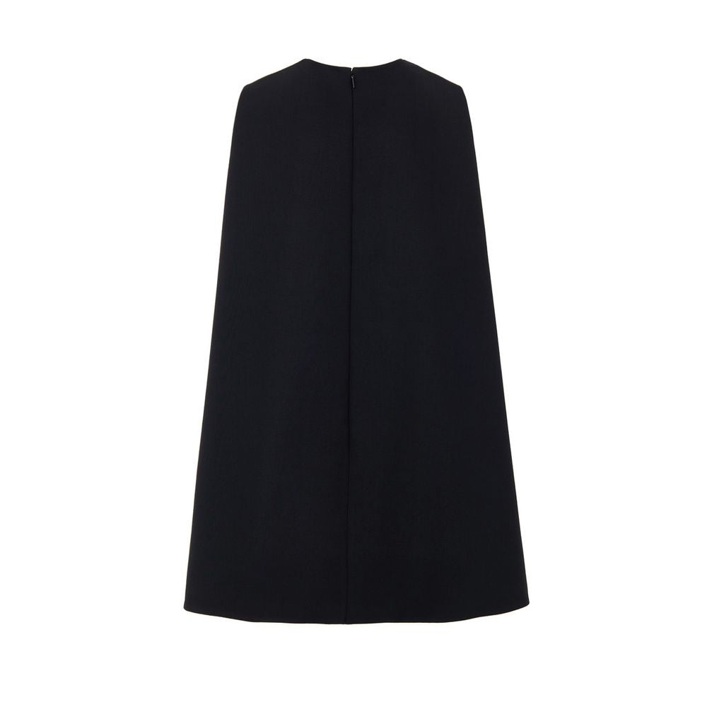 Dress by Gucci for women in wool black presents a sinuous silhouette, showcasing a sophisticated round neckline and detailed with a sinuous short for a refined finish.