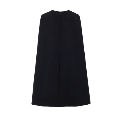 Dress by Gucci for women in wool black presents a sinuous silhouette, showcasing a sophisticated round neckline and detailed with a sinuous short for a refined finish.