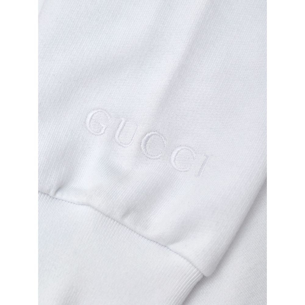 Sweatshirt by Gucci for women in cotton white features an provocated silhouette, detailed with a provocated and a refined round neckline for a sophisticated aesthetic.