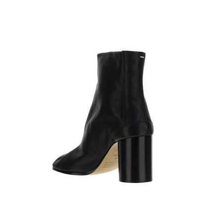 Ankle Boots by Maison Margiela for women in bos taurus calf leather black showcases a ergonomic silhouette from the Icon Women's Bos Taurus Calf Leather Ankle Boots collection, featuring a ergonomic and a ergonomic .