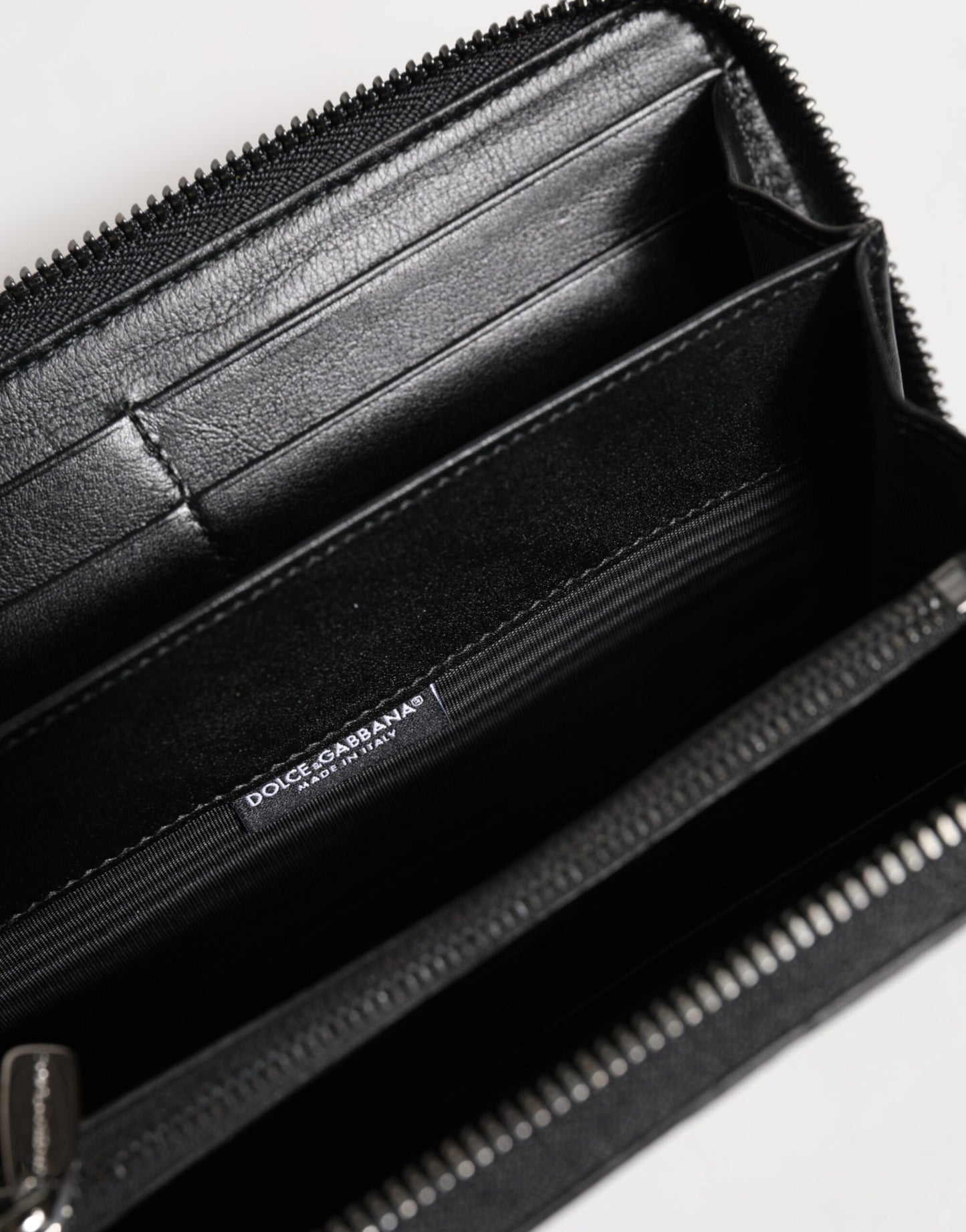 Cardholder Wallet by Dolce & Gabbana for men in caiman & calf leather black presents a streamlined silhouette, showcasing the sophisticated design of the Caiman Calf Leather Cardholder Wallet collection with functional card-organization zip-around coin-purse.