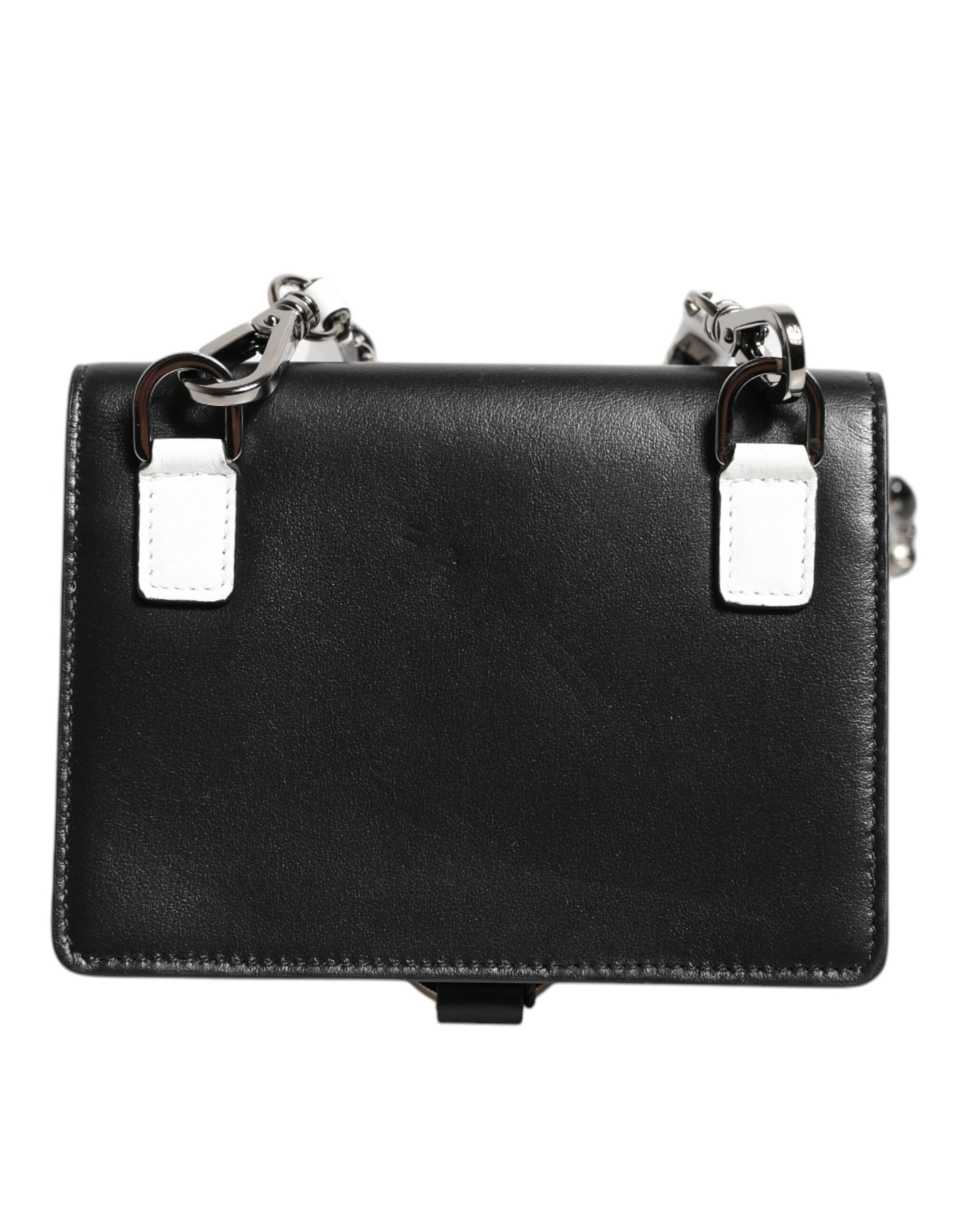 Cardholder Wallet by Dolce & Gabbana for women in brass crystal & calf leather black & silver presents a streamlined silhouette, showcasing the sophisticated design of the Brass Crystal Calf Leather Cardholder Wallet collection with functional card-organization.