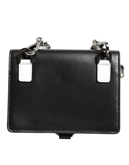 Cardholder Wallet by Dolce & Gabbana for women in brass crystal & calf leather black & silver presents a streamlined silhouette, showcasing the sophisticated design of the Brass Crystal Calf Leather Cardholder Wallet collection with functional card-organization.