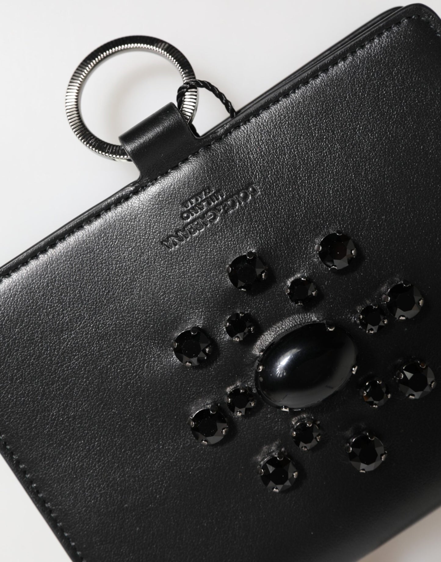 Cardholder Wallet by Dolce & Gabbana for women in brass crystal & calf leather black & silver showcases a discerning silhouette, artfully capturing the essence of Brass Crystal Calf Leather Cardholder Wallet with its functional card-organization.