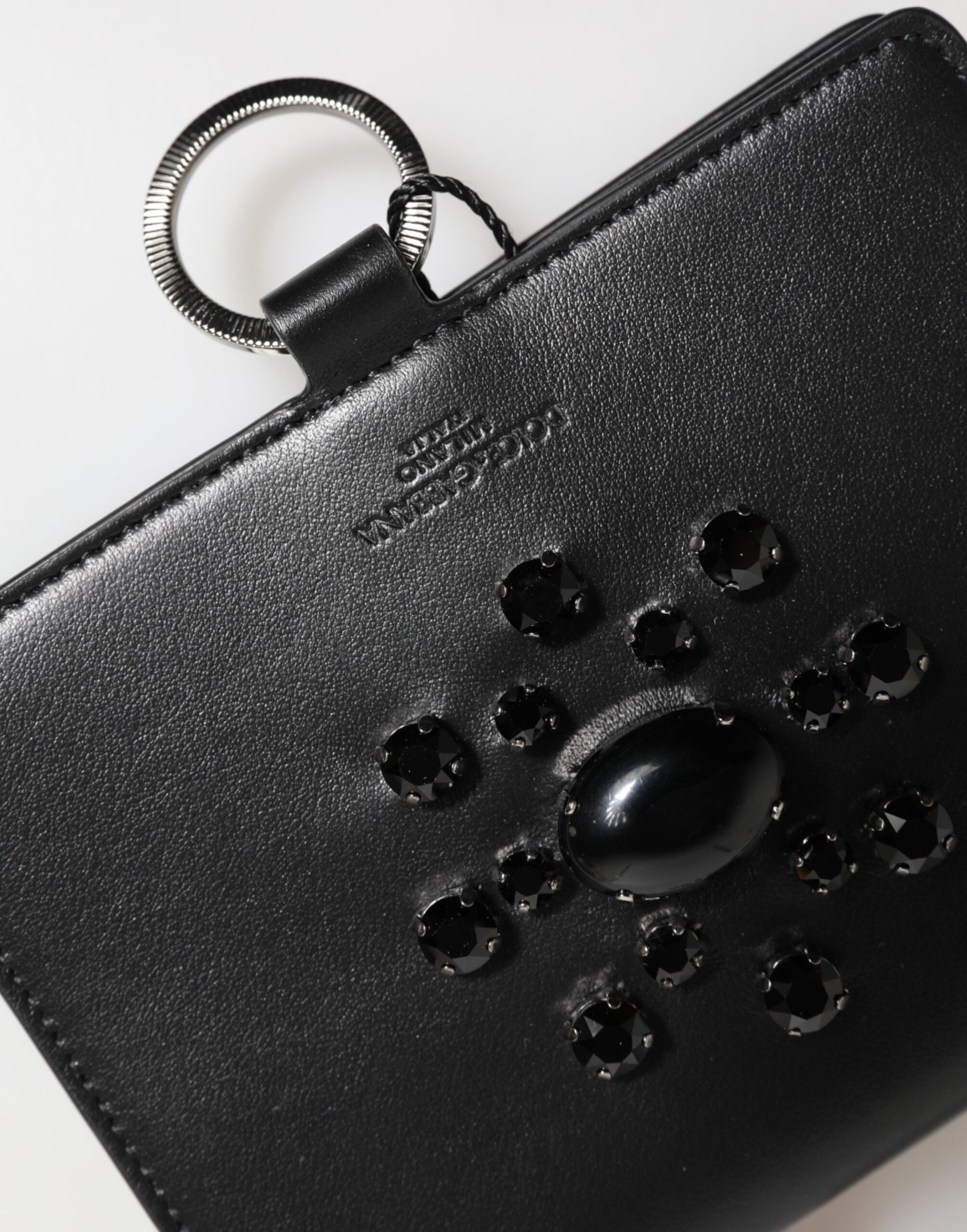 Cardholder Wallet by Dolce & Gabbana for women in brass crystal & calf leather black & silver showcases a discerning silhouette, artfully capturing the essence of Brass Crystal Calf Leather Cardholder Wallet with its functional card-organization.