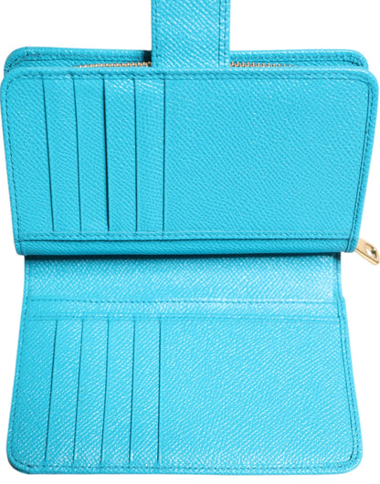 Wallet by Dolce & Gabbana for women in calf leather gold & light-blue presents a refined silhouette, artfully capturing the essence of the Calf Leather Wallet design with sophisticated bifold for a refined look.