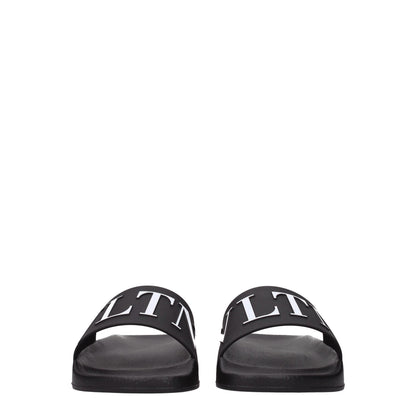 Flat Clogs Sandals by Valentino Garavani for men in cotton & rubber black features an exquisite silhouette, showcasing the exquisite Men's Cotton & Rubber Flat Clogs Sandals with a flat and open toe style.