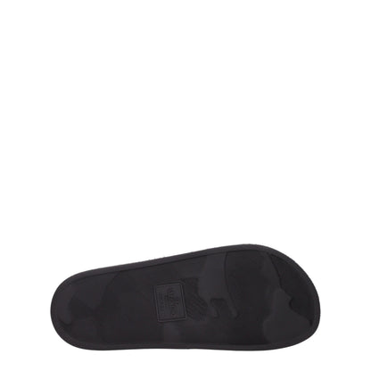 Flat Clogs Sandals by Valentino Garavani for men in cotton & rubber black features an effortlessly chic silhouette from the Men's Cotton & Rubber Flat Clogs Sandals collection, showcasing a effortlessly chic flat and elegant open toe style.