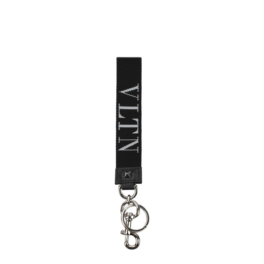 Keychain by Valentino Garavani for men in leather black, silver & white showcases a sleek silhouette, detailed with a and finished with .