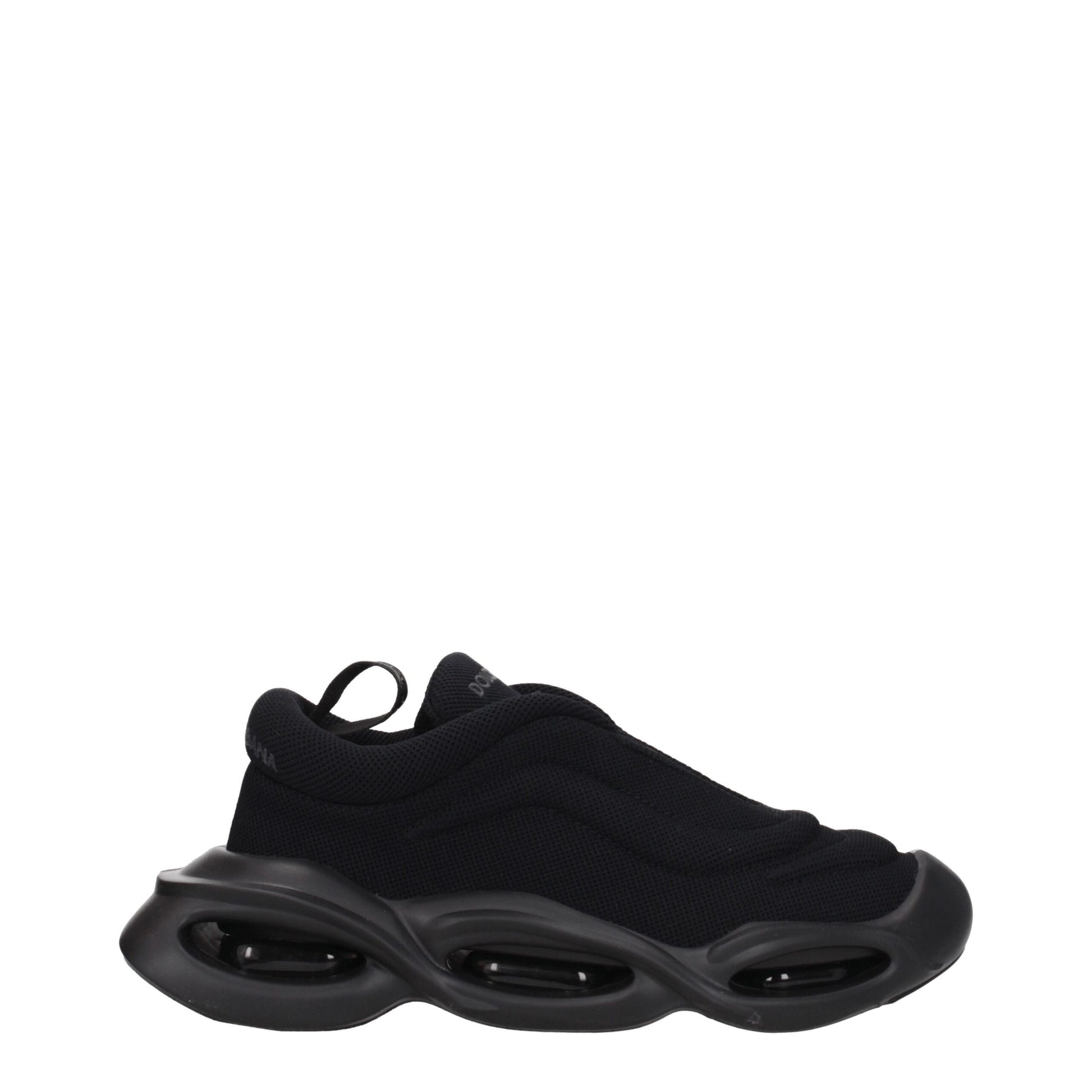 Sneakers by Dolce & Gabbana for men in rubber & fabric black presents a impeccable silhouette as Men's Chunky Rubber & Fabric Sneakers, expertly defined by a impeccable chunky style for a impeccable, high-fashion look.