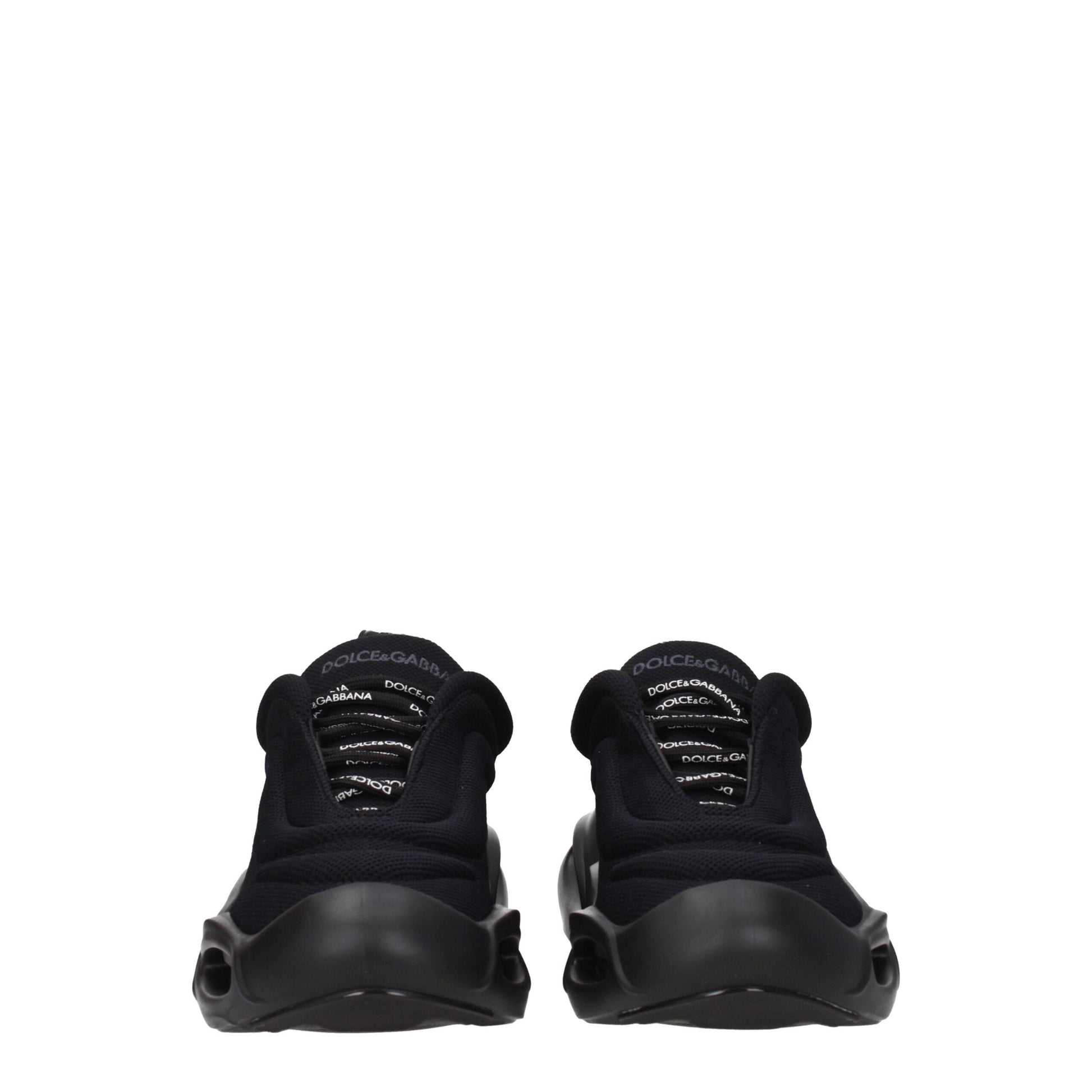 Sneakers by Dolce & Gabbana for men in rubber & fabric black presents a sumptuous silhouette, artfully capturing the essence of the Men's Chunky Rubber & Fabric Sneakers with its sumptuous chunky style design.