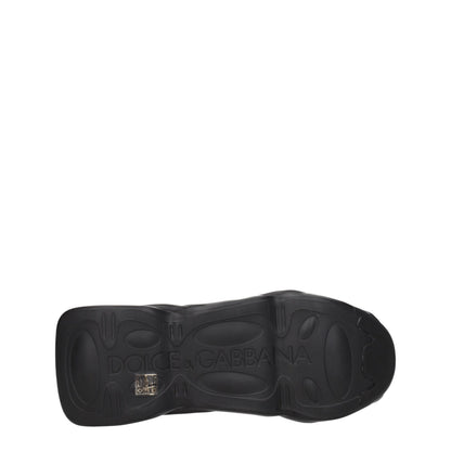 Sneakers by Dolce & Gabbana for men in rubber & fabric black presents a sumptuous silhouette, artfully capturing the essence of the Men's Chunky Rubber & Fabric Sneakers with its sumptuous chunky style design.