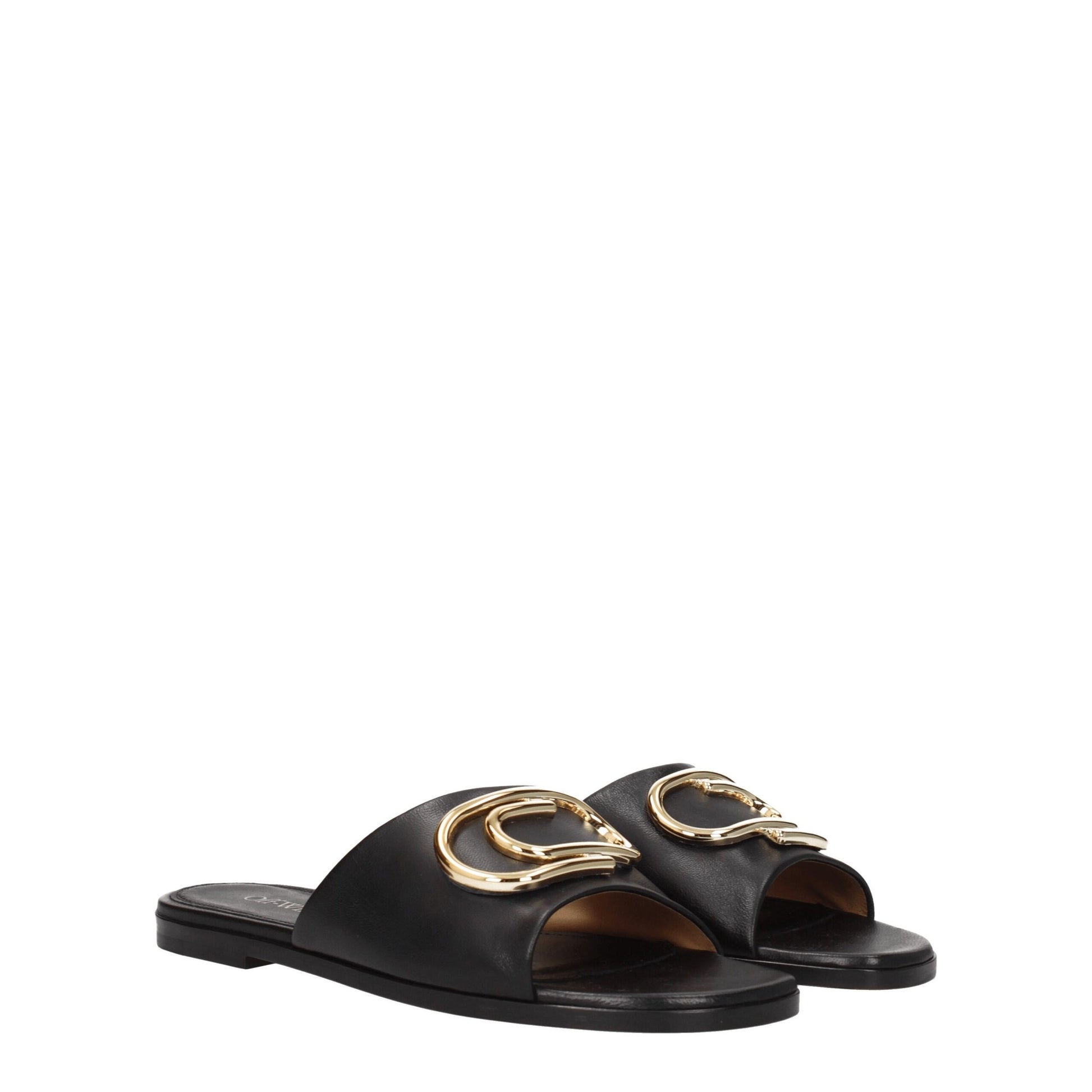Flat Clogs Sandals by Off-White for women in leather black, gold & white features an statuesque Women's Leather Flat Clogs Sandals silhouette with a refined flat and elegant open toe style.
