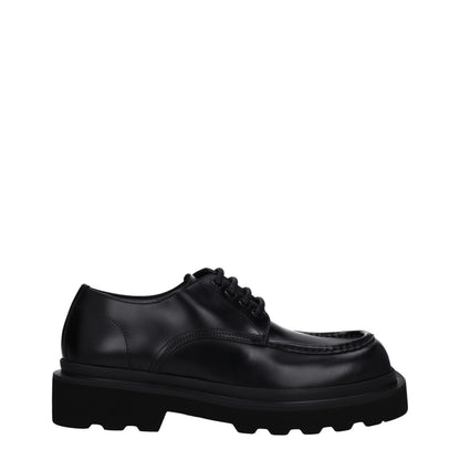 Mid-Heel Lace-Up Shoes by Dolce & Gabbana for men in leather & rubber black features an effortless chic silhouette, showcasing the Men's Leather & Rubber Mid-Heel Lace-Up Shoes design with an effortless chic 4-cm-heel mid-heel and a round toe style for a effortless chic look.