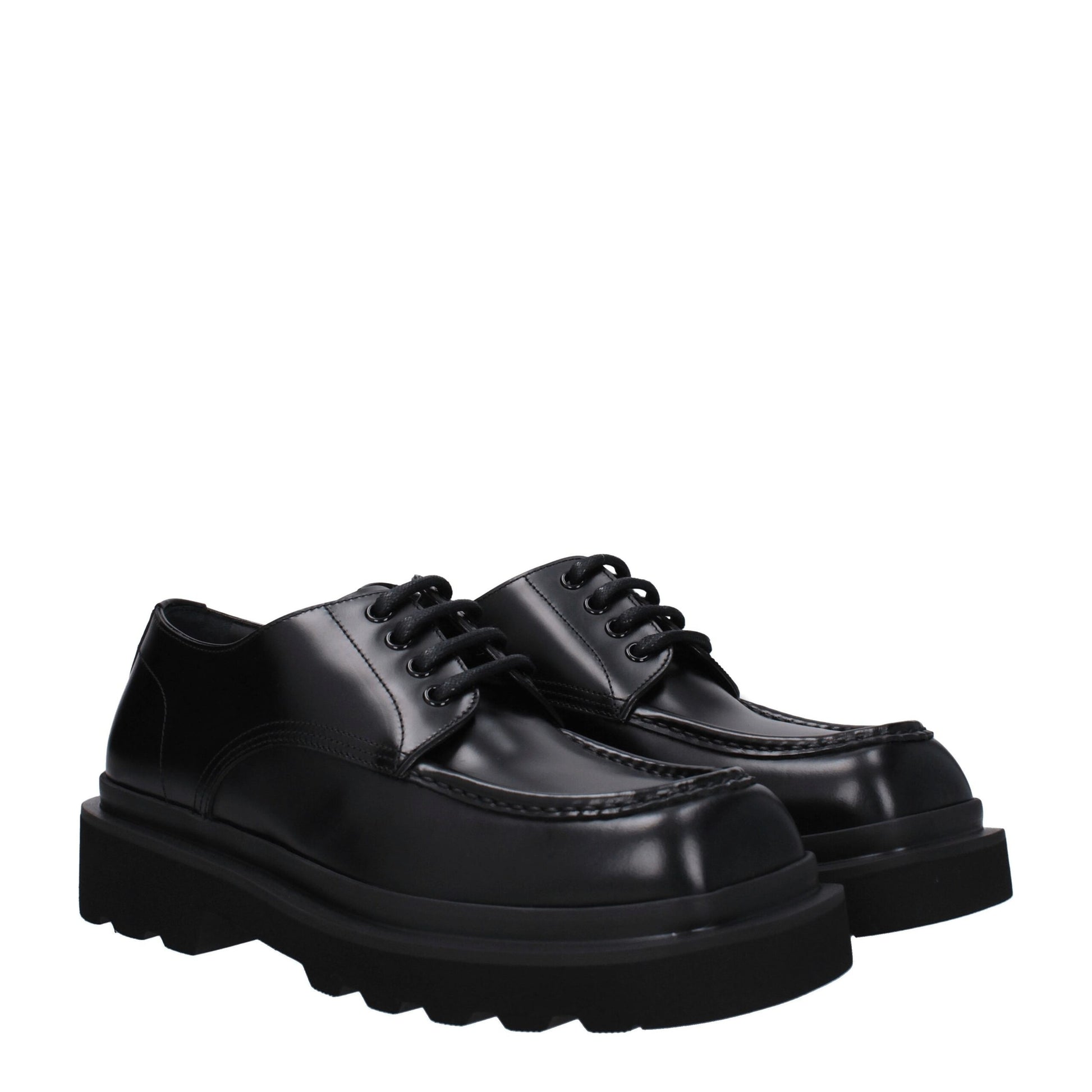 Mid-Heel Lace-Up Shoes by Dolce & Gabbana for men in leather & rubber black features an ergonomic silhouette, perfectly showcasing Men's Leather & Rubber Mid-Heel Lace-Up Shoes with its distinct 4-cm-heel mid-heel and elegant round toe style.