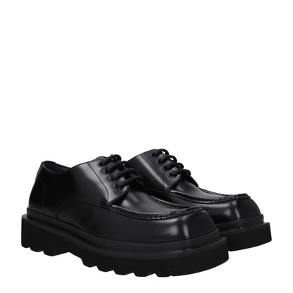 Mid-Heel Lace-Up Shoes by Dolce & Gabbana for men in leather & rubber black features an ergonomic silhouette, perfectly showcasing Men's Leather & Rubber Mid-Heel Lace-Up Shoes with its distinct 4-cm-heel mid-heel and elegant round toe style.