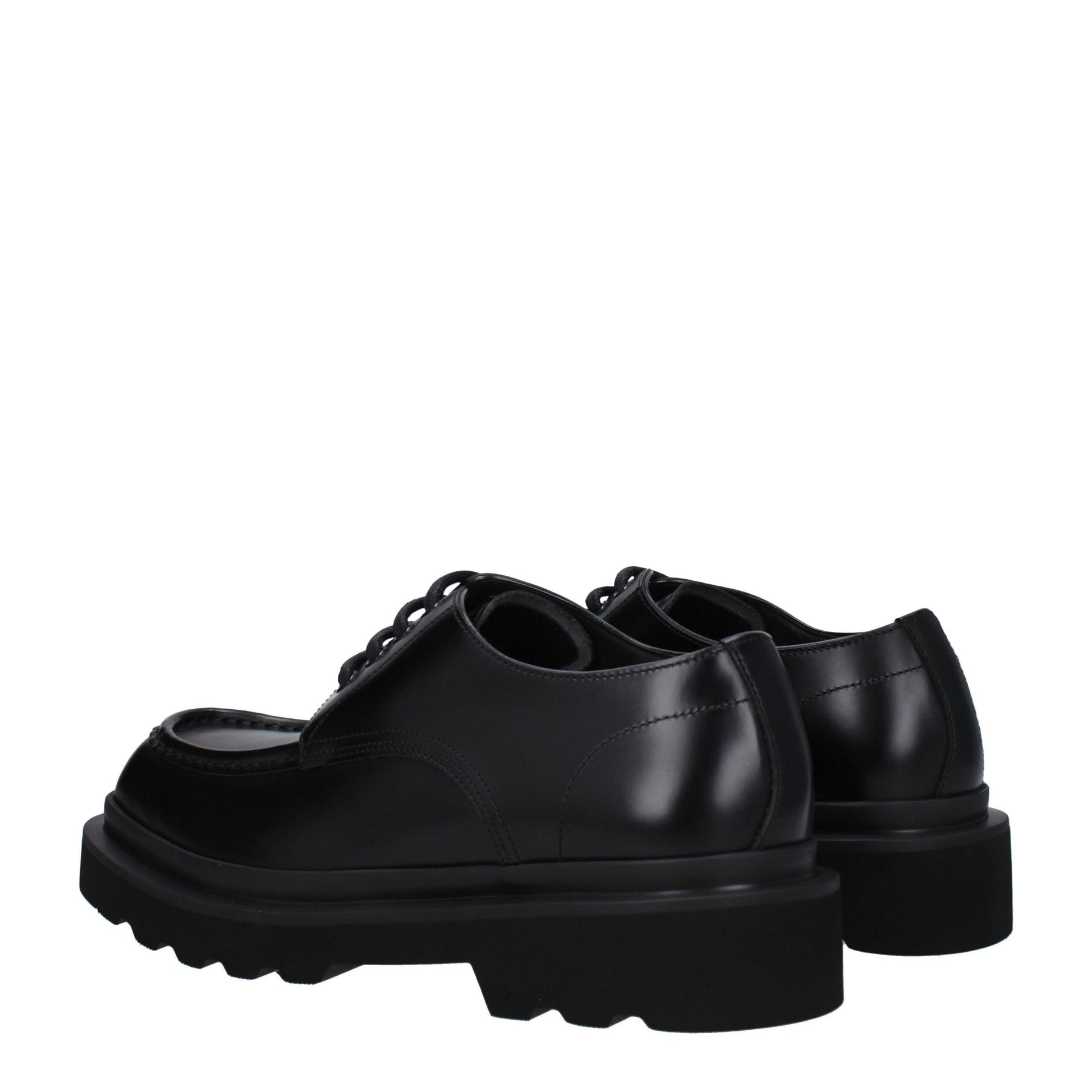 This Mid-Heel Lace-Up Shoes by Dolce & Gabbana for men in leather & rubber black features an exquisite silhouette from the Men's Leather & Rubber Mid-Heel Lace-Up Shoes collection, defined by a sophisticated 4-cm-heel mid-heel and elegant round toe style.