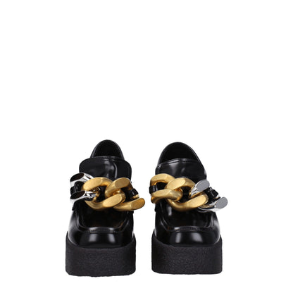 Very-High-Heel Platform Loafer Pumps Shoes by Stella McCartney for women in leather & rubber black showcases a impeccable silhouette as Women's Leather & Rubber Very-High-Heel Platform Loafer Pumps Shoes, artfully designed with a impeccable high-heel platform 11-cm-heel very-high-heel and refined square toe style for a impeccable finish.