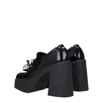 Very-High-Heel Platform Loafer Pumps Shoes by Stella McCartney for women in leather & rubber black showcases a resplendent Women's Leather & Rubber Very-High-Heel Platform Loafer Pumps Shoes aesthetic, defined by its resplendent square toe style and elegant high-heel platform 11-cm-heel very-high-heel.