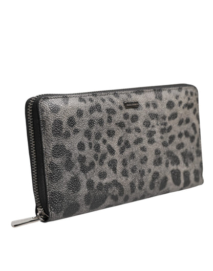 Cardholder Wallet by Dolce & Gabbana for men in pvc leather black & gray showcases a discerning silhouette, artfully capturing the essence of PVC Leather Cardholder Wallet with its functional card-organization zip-around coin-purse.
