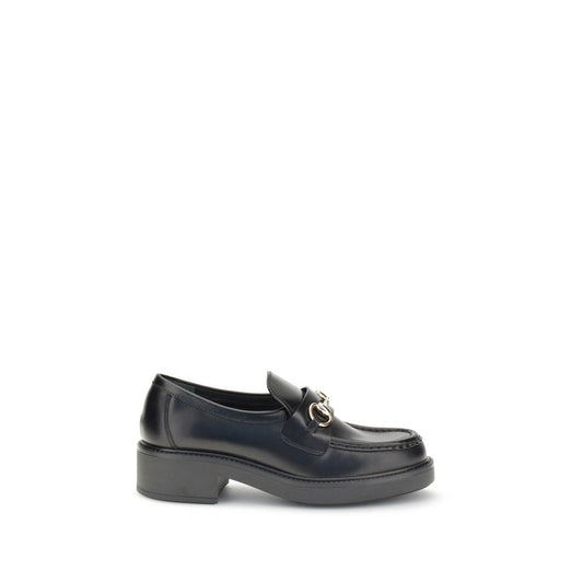 This Loafer Loafers Slip-On Shoes by Gucci for women in bos taurus calf leather black features an timeless silhouette from the Horsebit Women's Bos Taurus Calf Leather Loafer Loafers Slip-On Shoes collection, defined by a sophisticated block-heel and elegant round toe style.