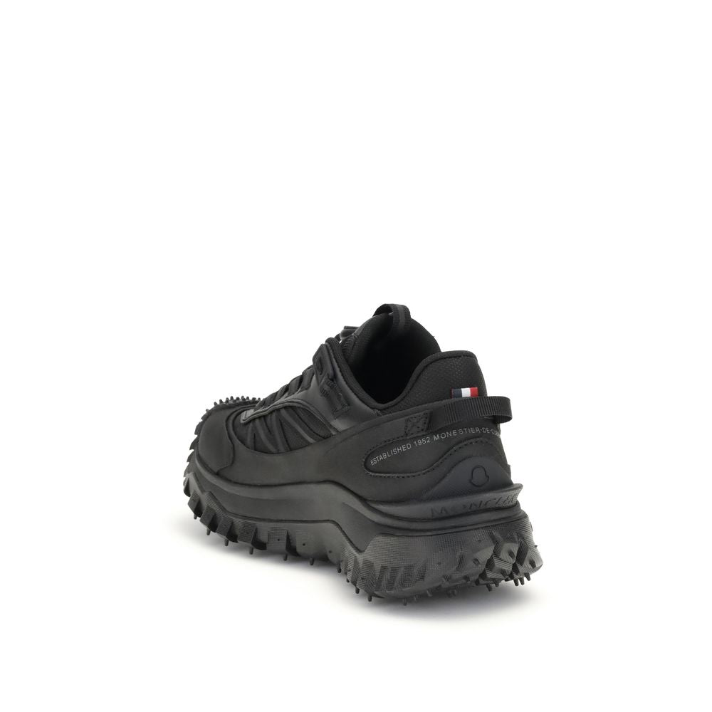 Athletic Sneakers by Moncler for women in black & print presents a sleek silhouette, perfectly capturing the low-top style essence of Women's Low Top Bos Taurus Calf Leather & Polyester Athletic Sneakers with its sleek design and premium finish.