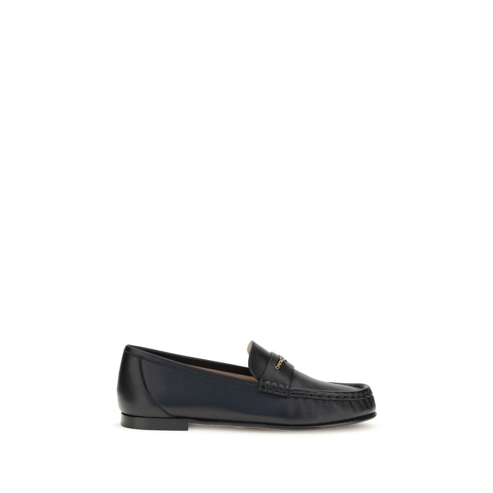 This Loafer Shoes by Chloé for unisex in bos taurus calfskin leather black & gold features an exquisite silhouette from the Unisex Bos Taurus Calfskin Leather Loafer Shoes collection, defined by a sophisticated and elegant .