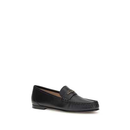 Loafer Shoes by Chloé for unisex in bos taurus calfskin leather black & gold showcases a timeless silhouette from the Unisex Bos Taurus Calfskin Leather Loafer Shoes collection, featuring a timeless and for a timeless finish.