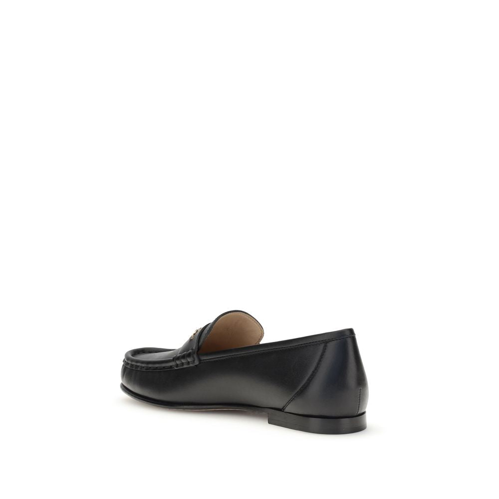 Loafer Shoes by Chloé for unisex in bos taurus calfskin leather black & gold showcases a impeccable silhouette as Unisex Bos Taurus Calfskin Leather Loafer Shoes, artfully designed with a impeccable and refined for a impeccable finish.