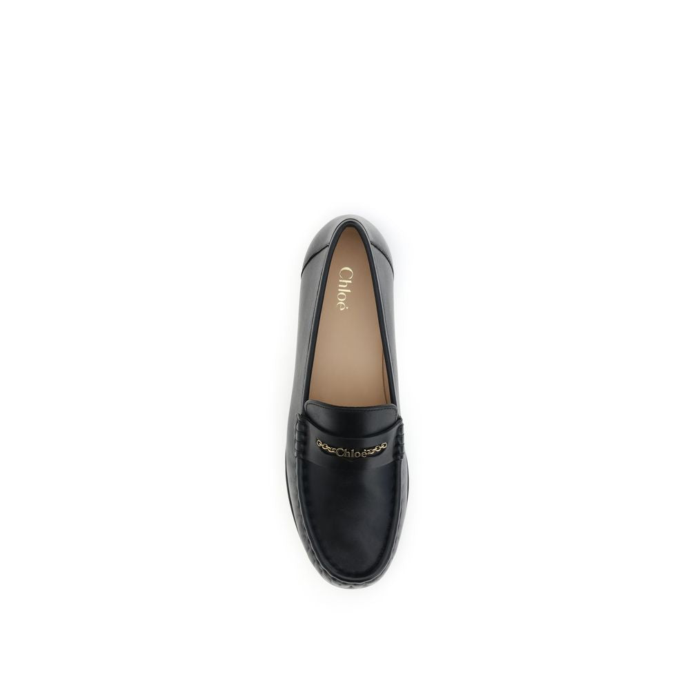 Loafer Shoes by Chloé for unisex in bos taurus calfskin leather black & gold features an ergonomic silhouette, perfectly showcasing Unisex Bos Taurus Calfskin Leather Loafer Shoes with its distinct and elegant .