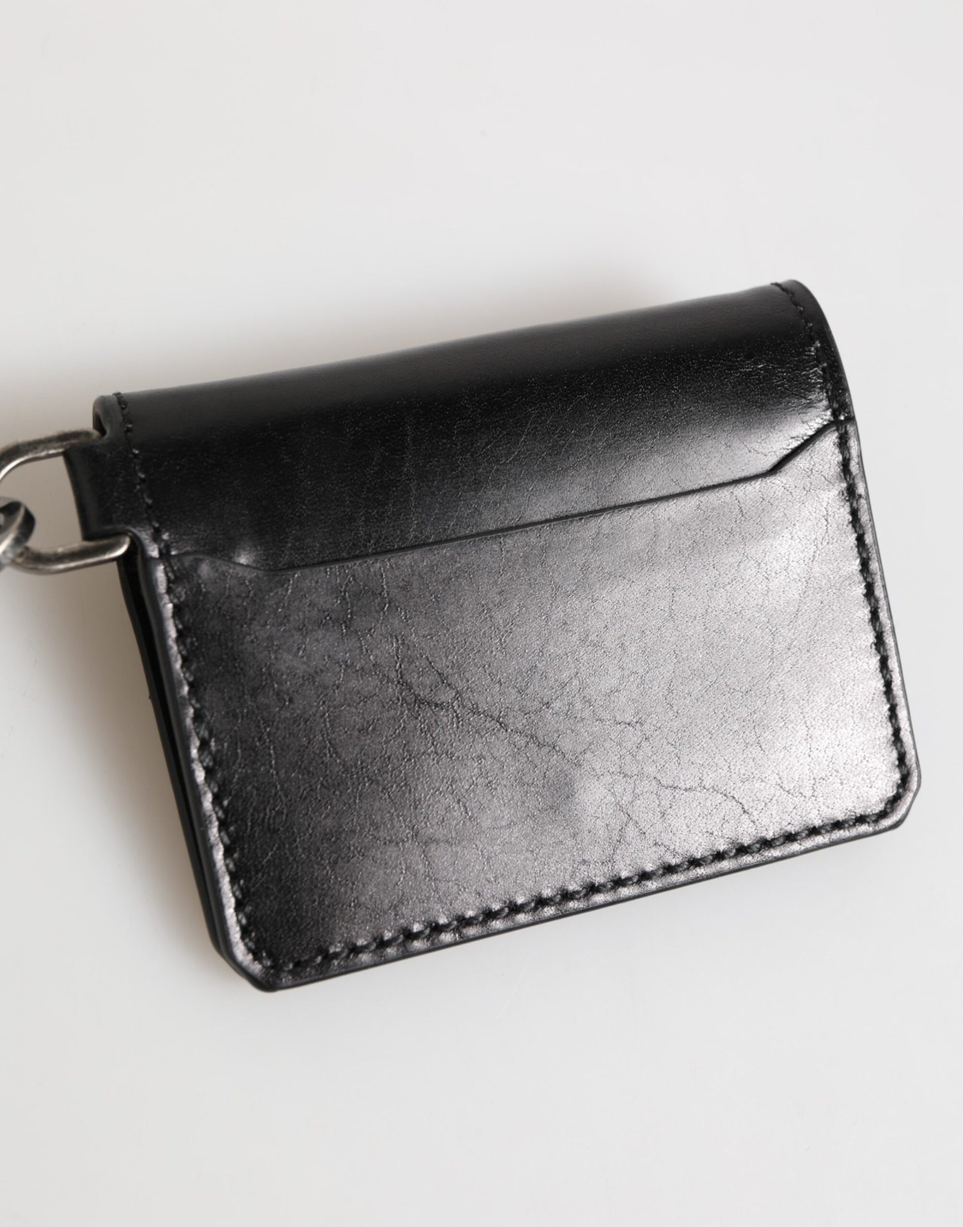 Cardholder Wallet by Dolce & Gabbana for men in horse leather black showcases a discerning silhouette, artfully capturing the essence of Horse Leather Cardholder Wallet with its functional card-organization.