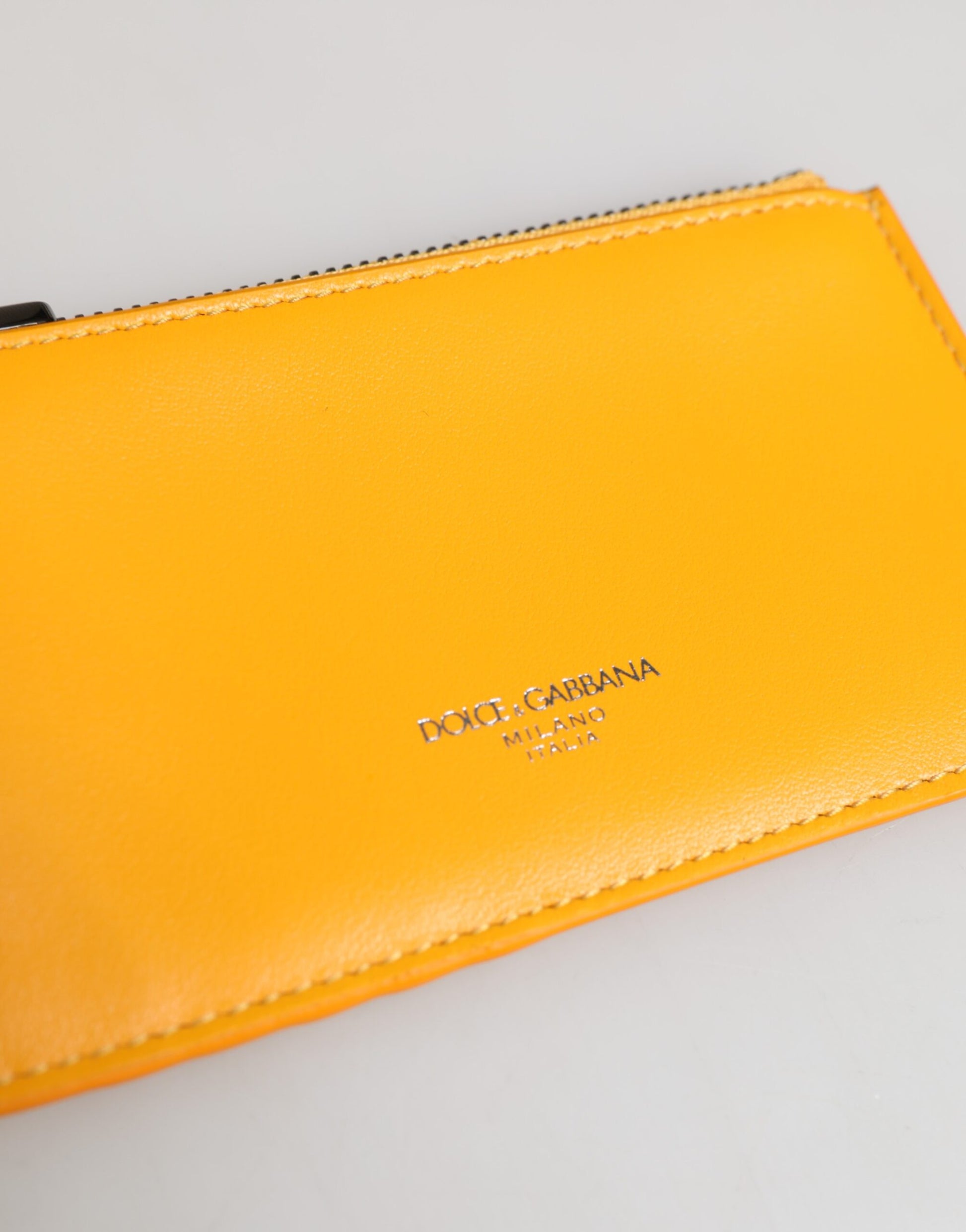 Cardholder Wallet by Dolce & Gabbana for men in calf leather orange & yellow showcases a discerning silhouette, artfully capturing the essence of Calf Leather Cardholder Wallet with its functional card-organization.