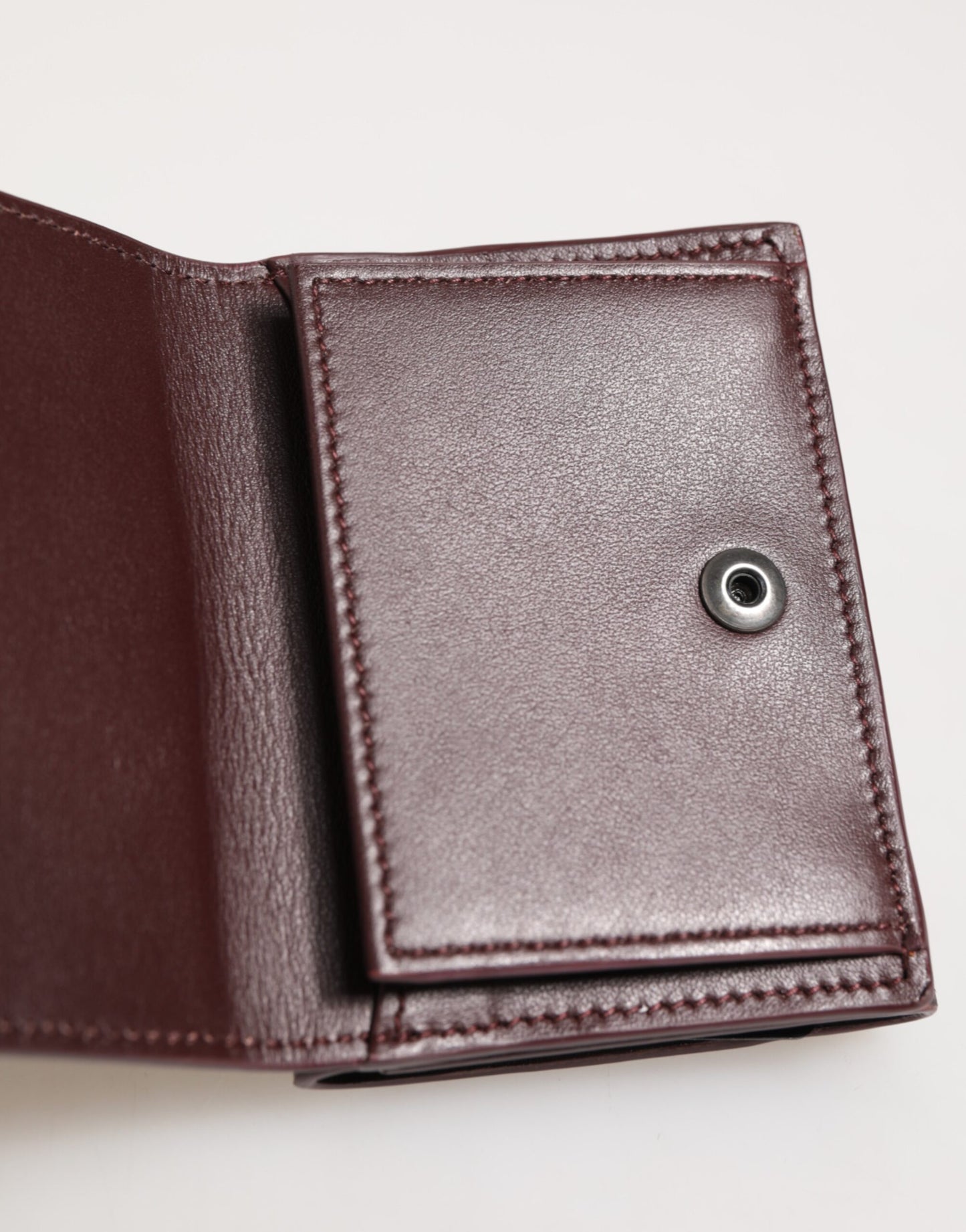 Cardholder Wallet by Dolce & Gabbana for men in leather brown showcases a refined silhouette, artfully detailed with the signature style of the Leather Cardholder Wallet and functional card-organization trifold.