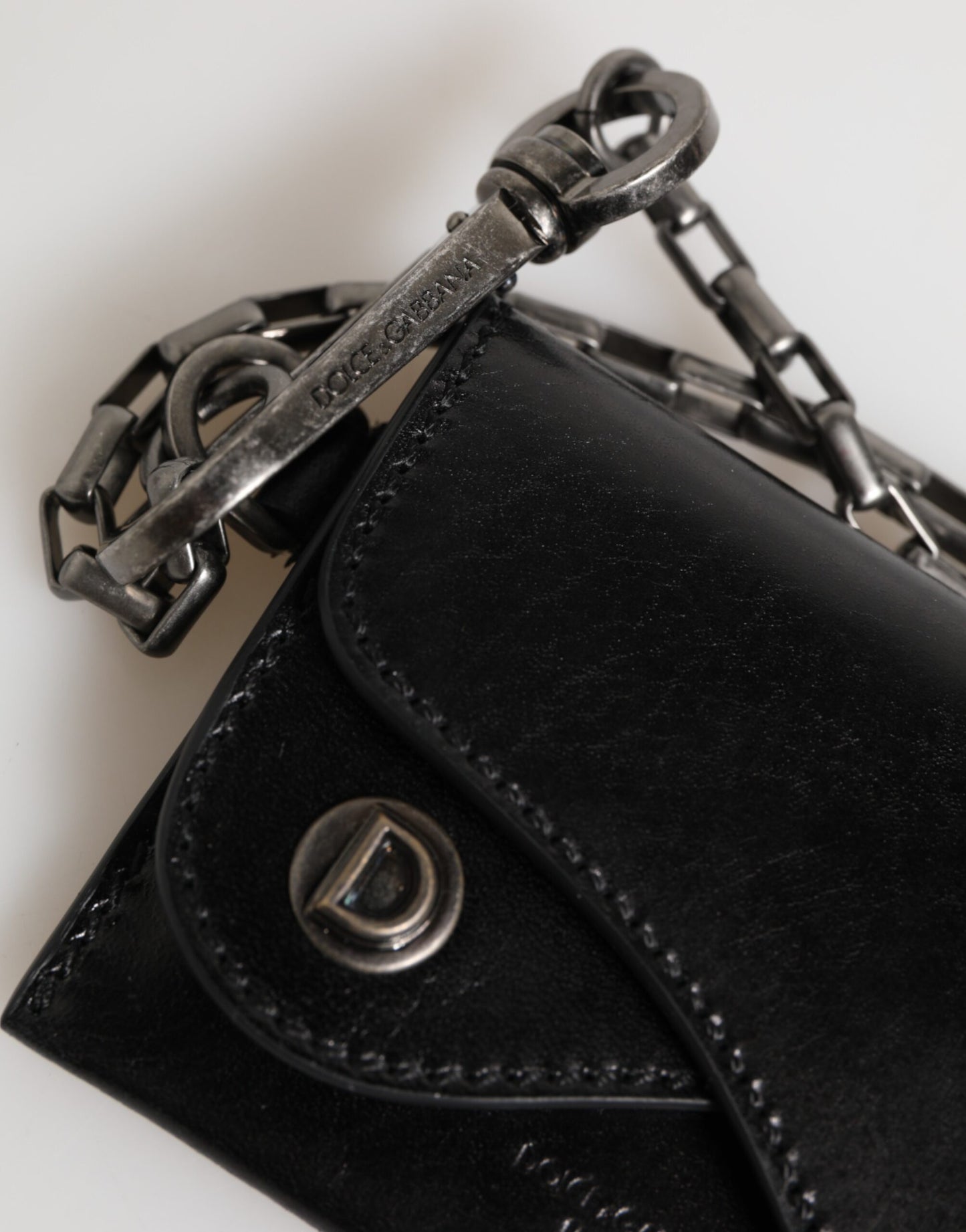 Cardholder Wallet by Dolce & Gabbana for men in cavallo horse leather black, silver & monogram presents a streamlined silhouette, showcasing the sophisticated design of the Pony Cavallo Horse Leather Cardholder Wallet collection with functional card-organization compact-design bifold.