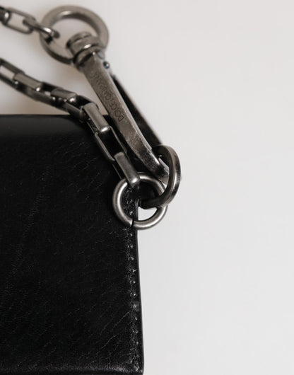 Cardholder Wallet by Dolce & Gabbana for men in cavallo horse leather black, silver & monogram showcases a discerning silhouette, artfully capturing the essence of Pony Cavallo Horse Leather Cardholder Wallet with its functional card-organization compact-design bifold.