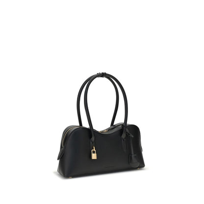 Medium Shoulder Bag by Stella McCartney for women in leatherette black features an effortlessly chic silhouette with a secure , ample , and versatile shoulder-strap & handle for effortlessly chic everyday luxury.