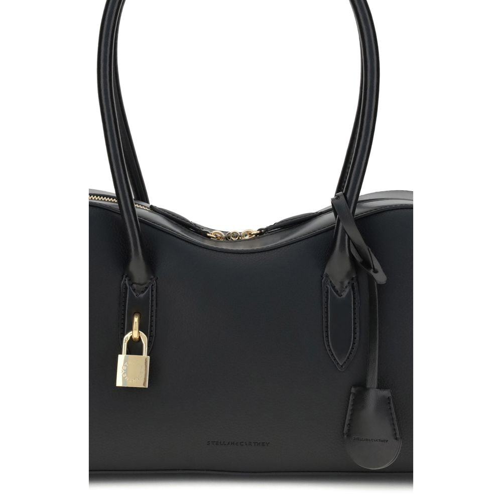 Medium Shoulder Bag by Stella McCartney for women in leatherette black features a effortless chic silhouette with a secure , ample , and versatile shoulder-strap & handle for a effortless chic finish.