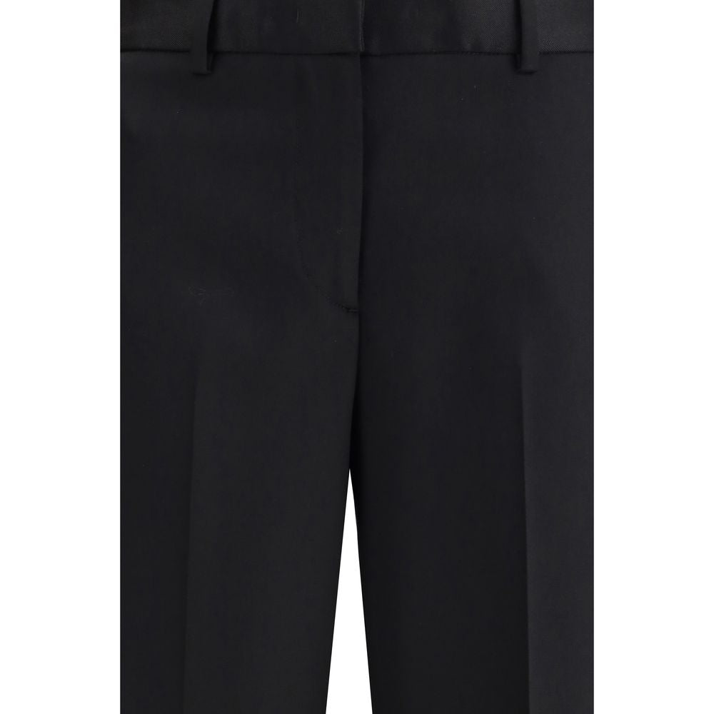 Pants by Lardini for women in wool black features a sleek silhouette with a sleek straight & regular-fit, a refined long, and a sophisticated finish.