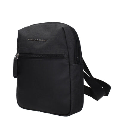 Crossbody Handbag by Piquadro for unisex in fabric black features an multi-faceted design with a secure , ample , and versatile crossbody-strap & adjustable-strap for a multi-faceted finish.