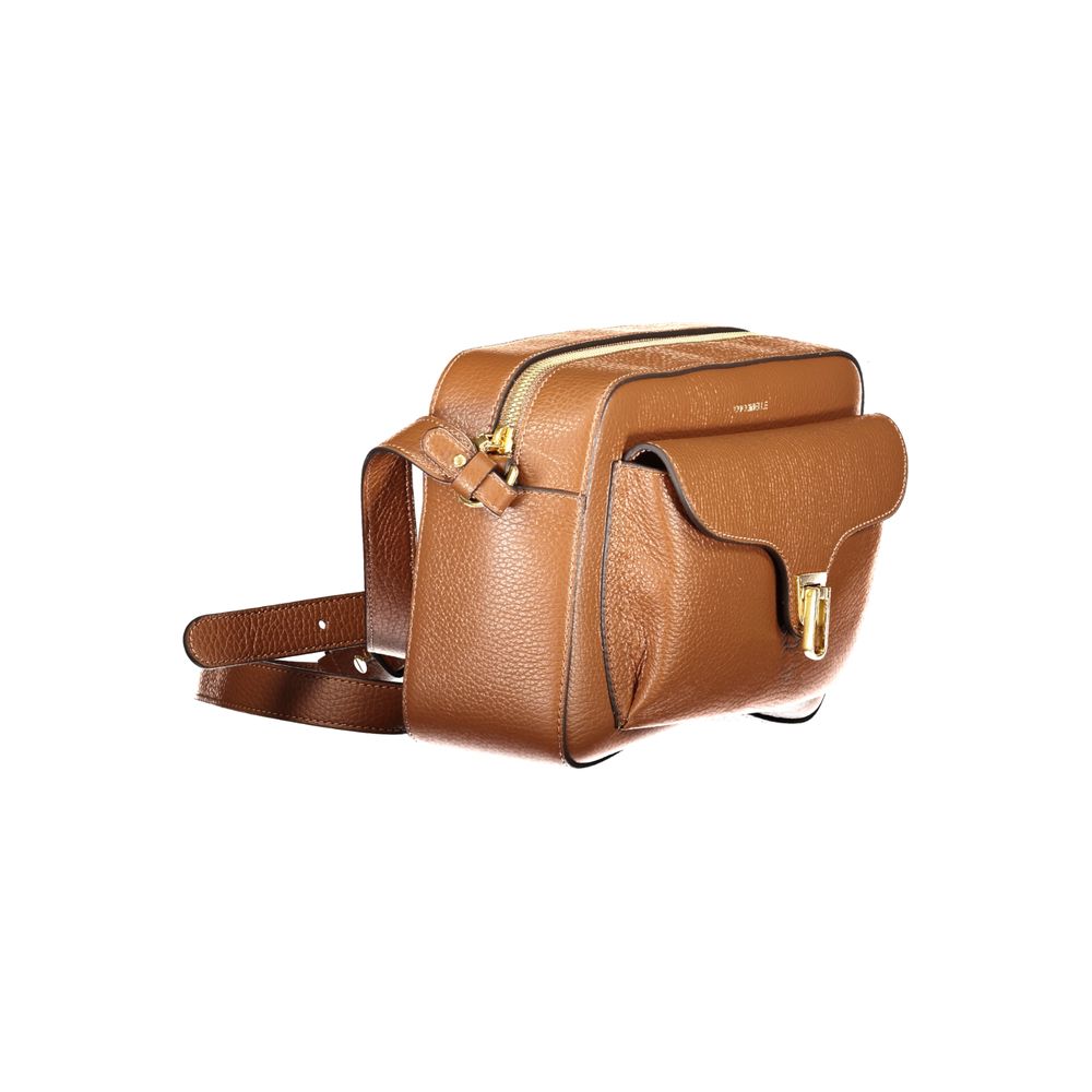 Handbag by Coccinelle for women in leather & metal brown & signature features a refined silhouette, showcasing a secure zipper, organized external-pockets & internal-pockets, and versatile shoulder-strap & adjustable-strap for a refined finish.