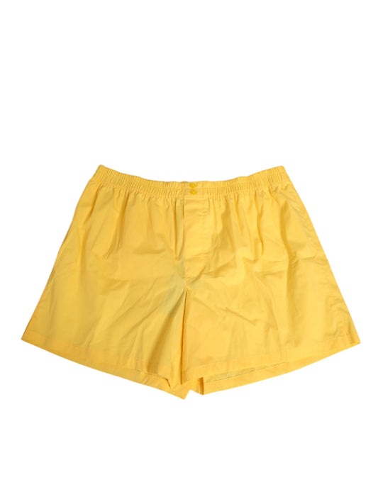Swim Shorts by Dolce & Gabbana for men in cotton yellow features a riviera-ready silhouette, showcasing the Men's Cotton Swim Shorts design for a premium look.