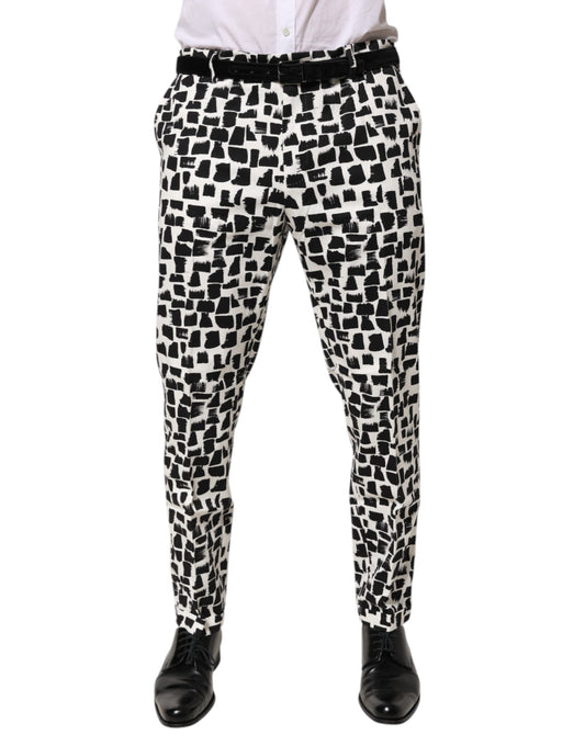 Trousers by Dolce & Gabbana for men in stretch cotton black, white & print features an sartorial silhouette, showcasing a precise skinny and long with a sartorial for a refined look.