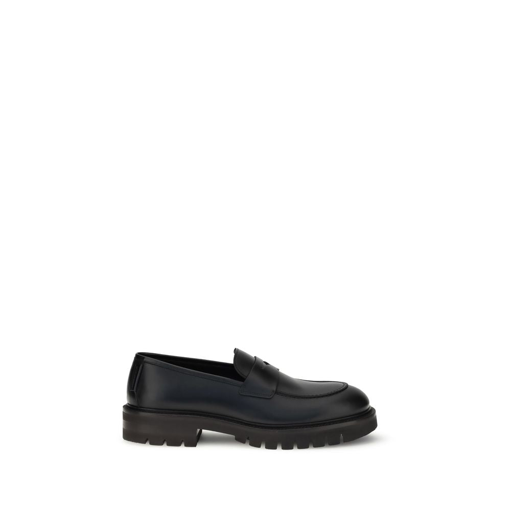 Sneakers by Ferragamo for men in bos taurus calfskin leather black presents a impeccable silhouette as Men's Fashion Bos Taurus Calfskin Leather Sneakers, expertly defined by a impeccable fashion style for a impeccable, high-fashion look.