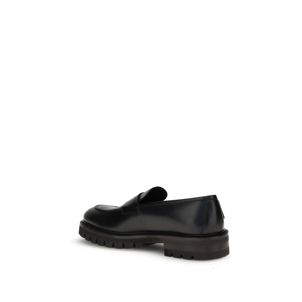 Sneakers by Ferragamo for men in bos taurus calfskin leather black presents a impeccable silhouette as Men's Fashion Bos Taurus Calfskin Leather Sneakers, expertly defined by a impeccable fashion style for a impeccable, high-fashion look.
